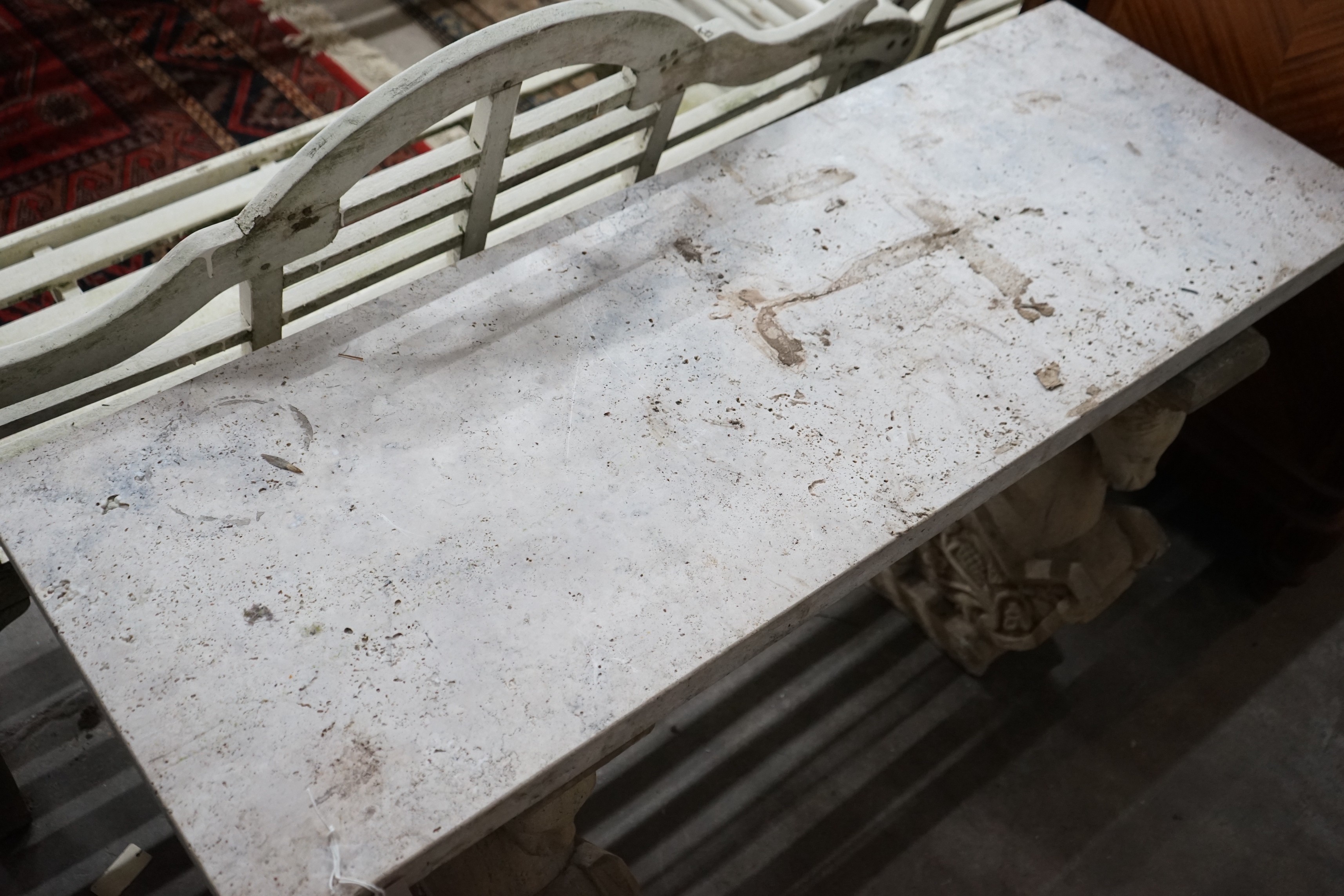 A carved stone Pegasus console table, width 127cm, depth 46cm, height 66cm